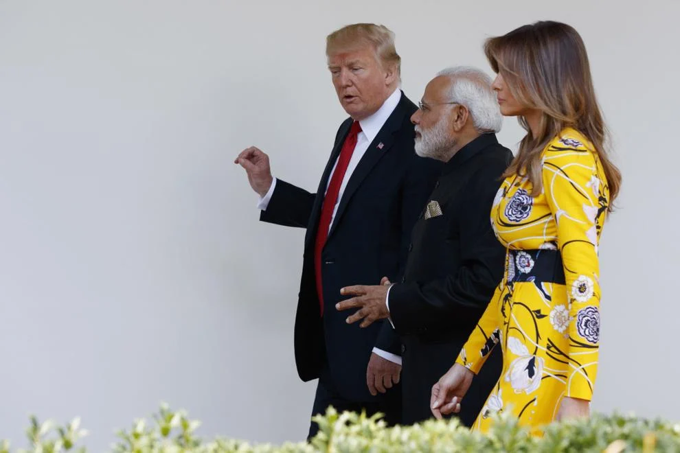 Indian prime minister, Narendra Modi, strolls alongside President Donald Trump along with the president's wife Melania Trump at the White House within Washington, D.C.