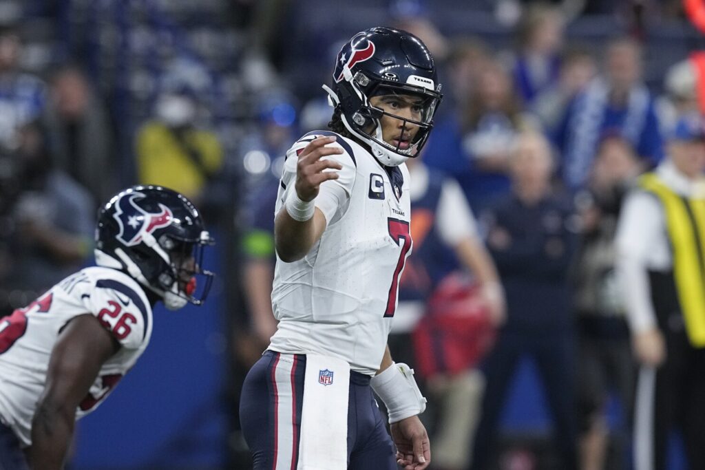 C.J. Stroud, a rookie, and the Texans defeat the Colts to secure a playoff berth.
