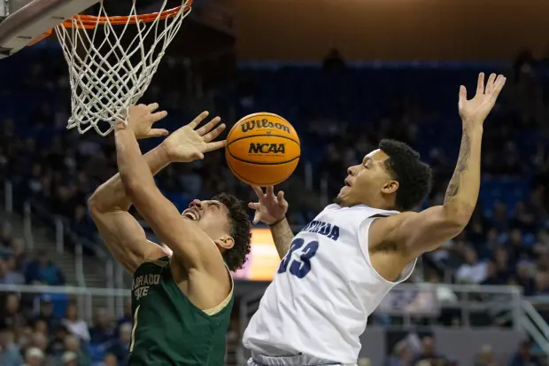 In Nevada's 77-64 victory over Colorado State, ranked No. 24, Jarod Lucas scores 28 points.
